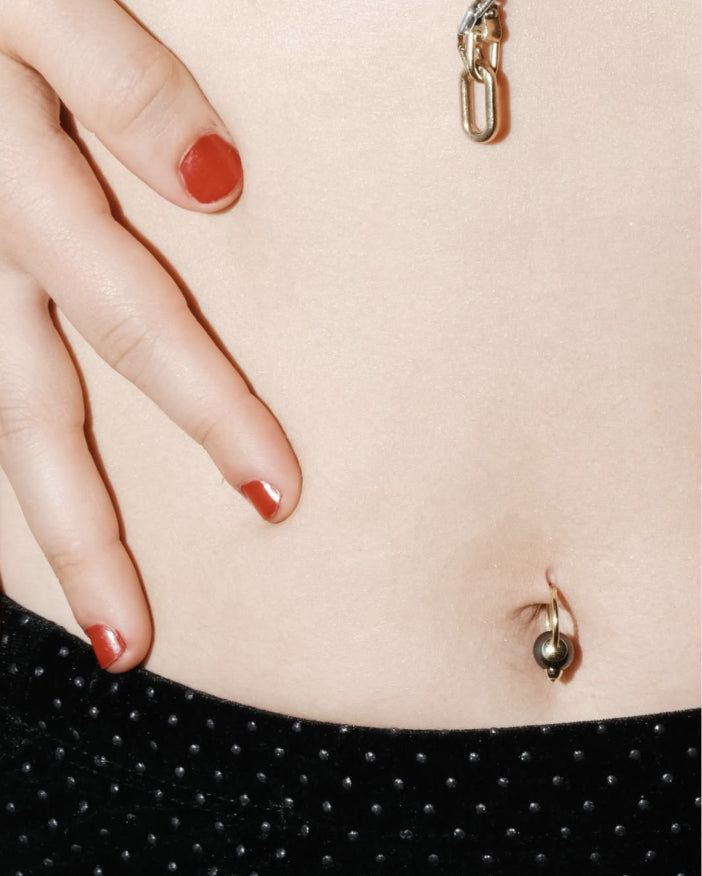Belly button piercing