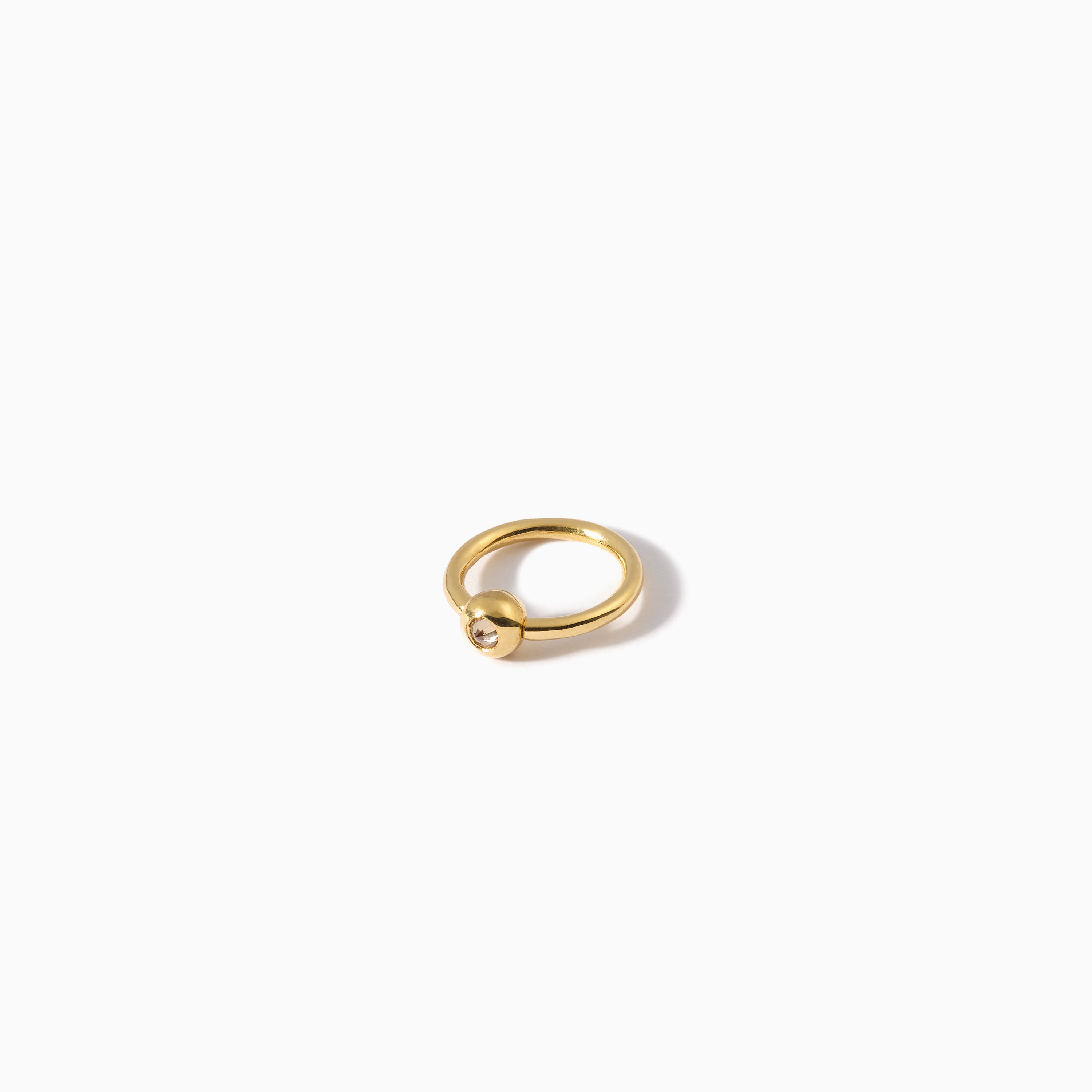 Studded Teardrop Captive Ring 16G S Champagne