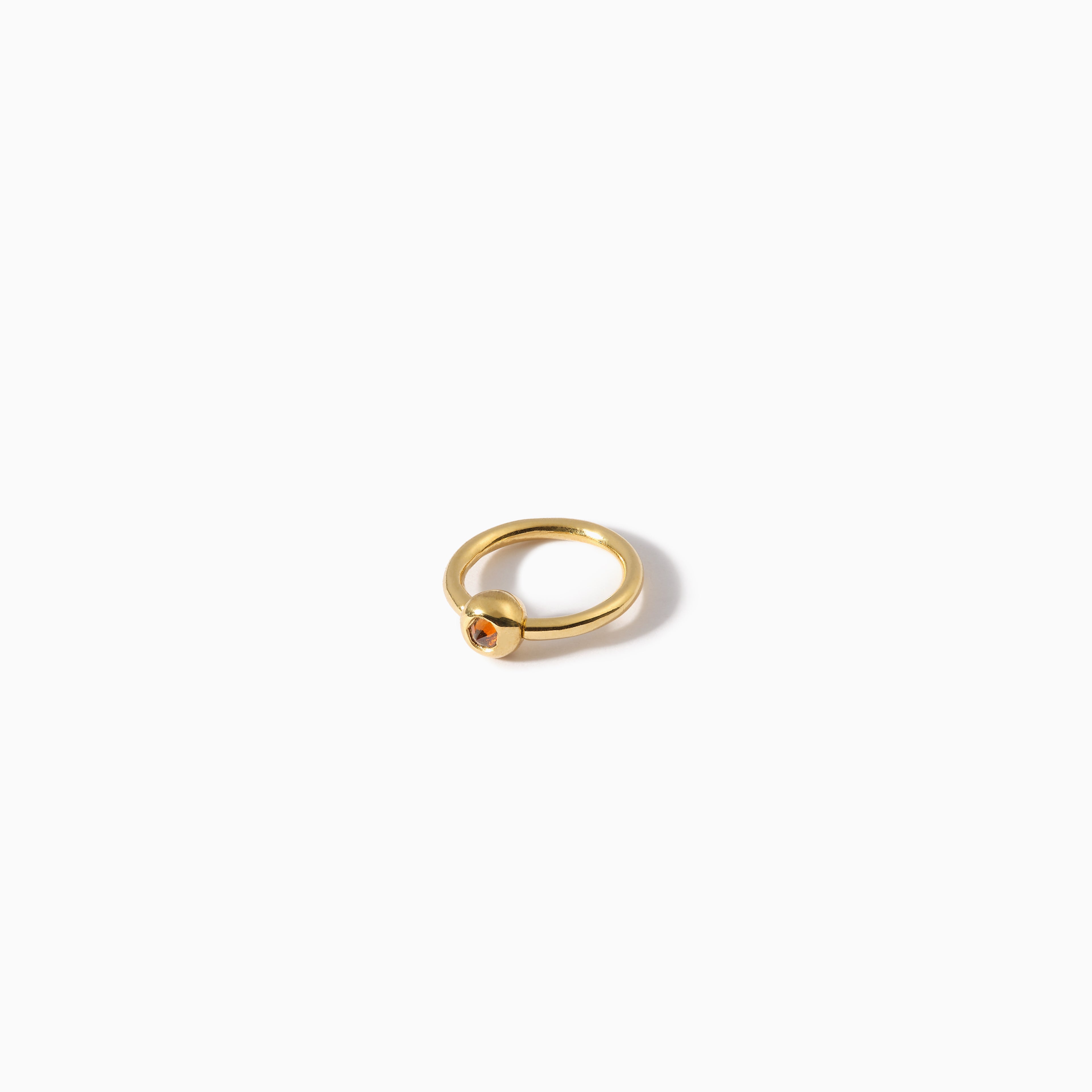 Studded Teardrop Captive Ring 16G S Cognac