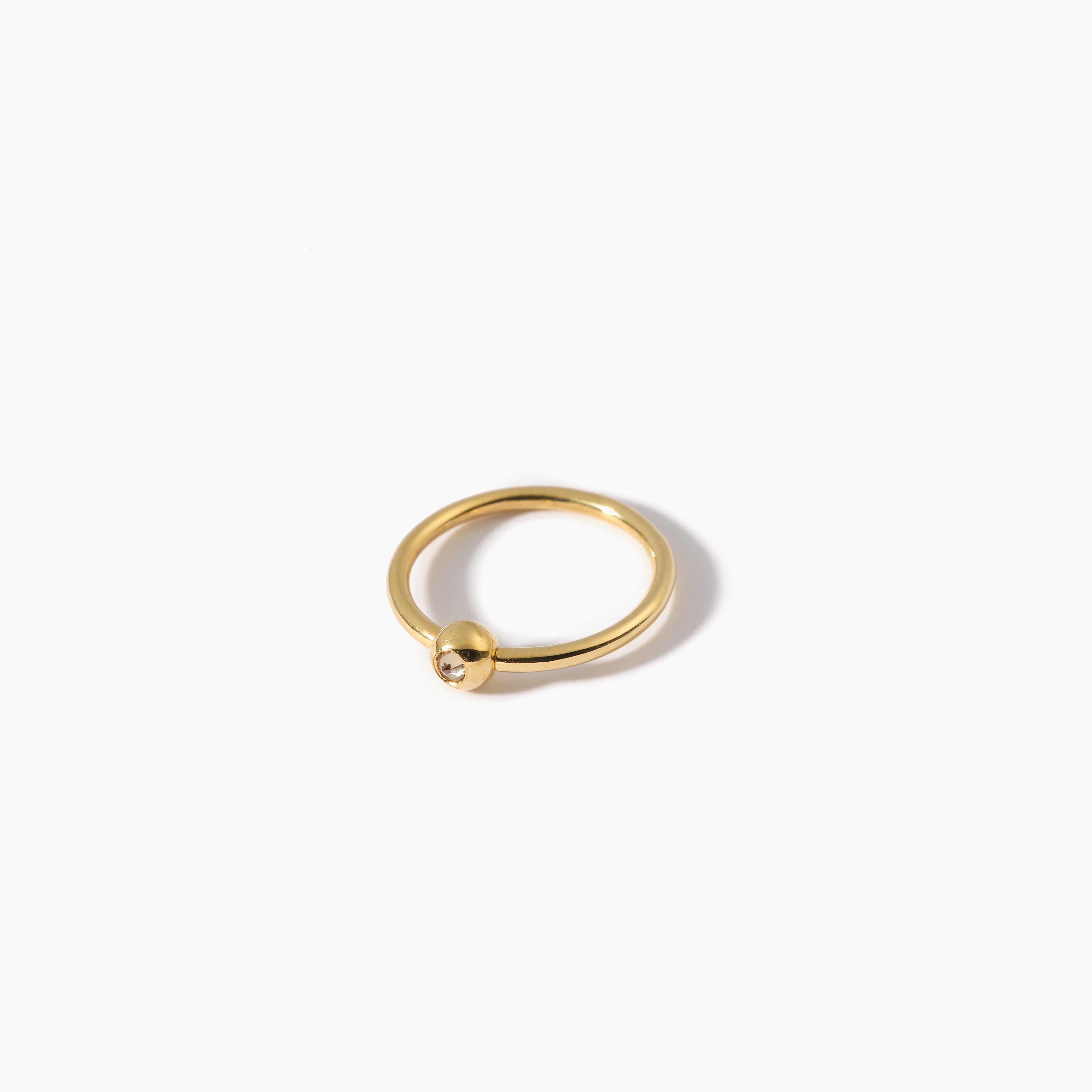 Studded Teardrop Captive Ring 16G L Champagne