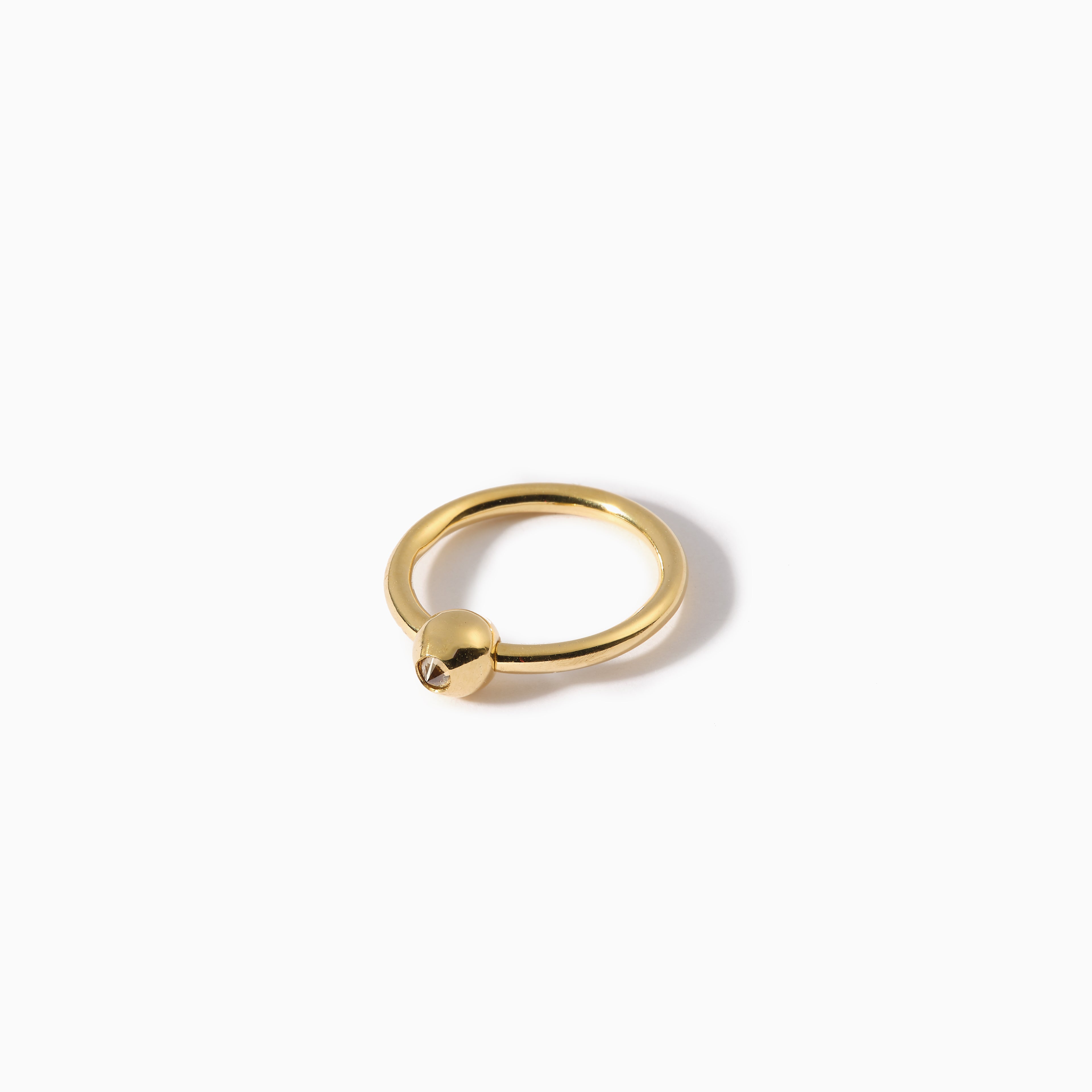 Studded Teardrop Captive Ring 14G L Champagne