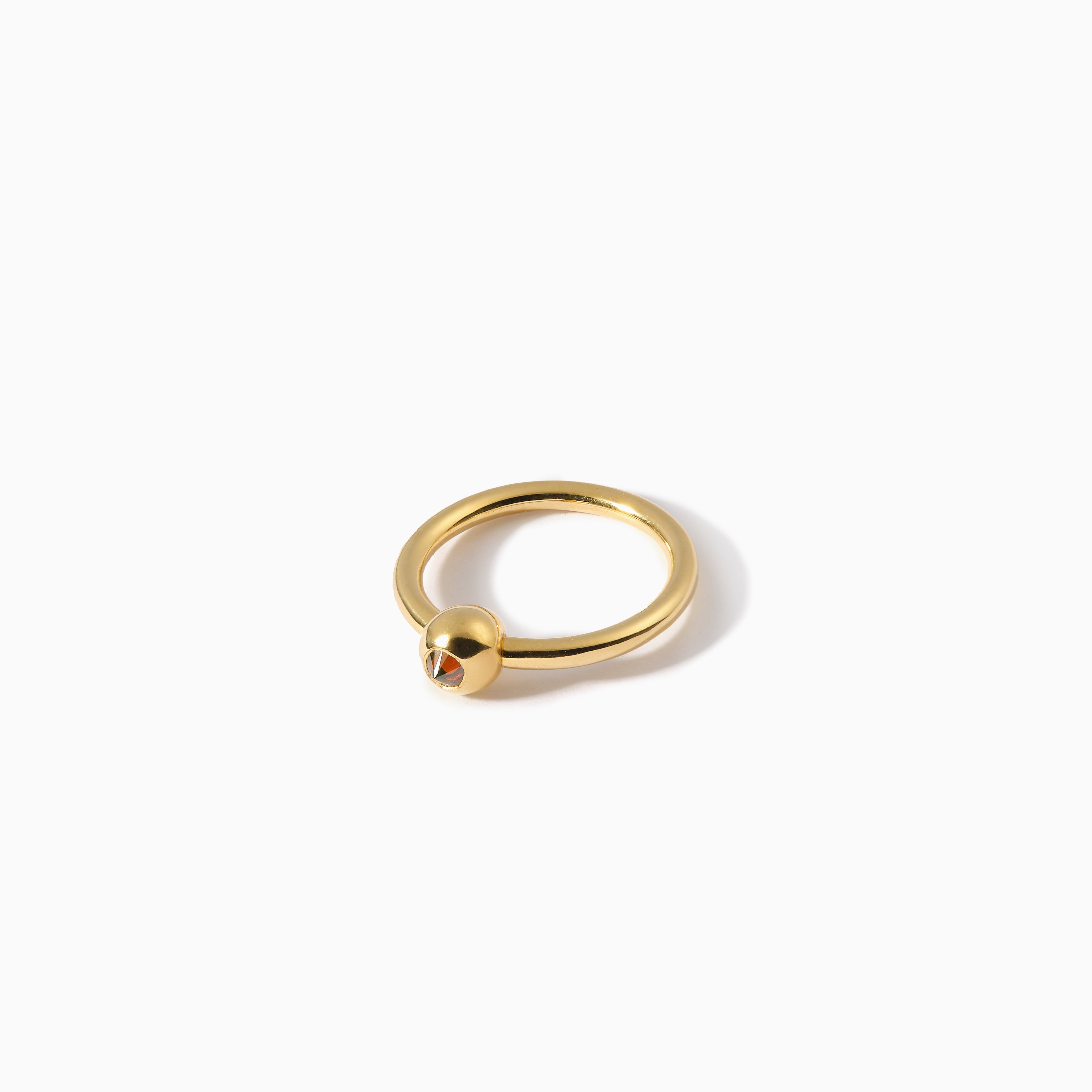 Studded Teardrop Captive Ring 14G L Cognac